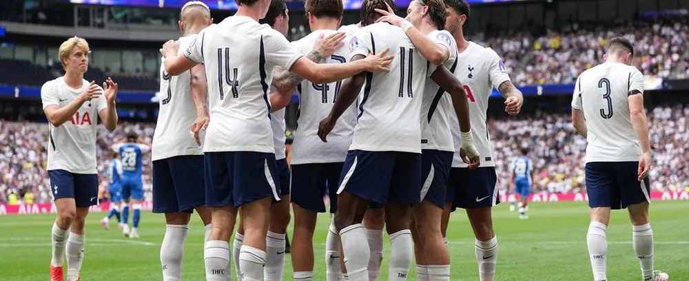 Tottenham players celebrate a goal against Hoffenheim at the Tottenham Hotspur Stadium