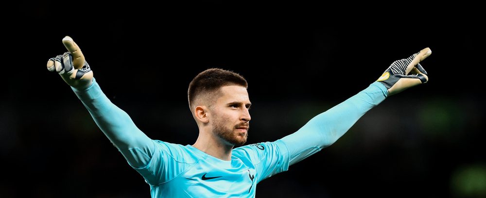 Guglielmo Vicario with both arms outstretched at the Tottenham Hotspur Stadium